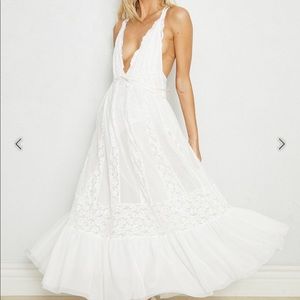 We are HAH , white , ivory dress.